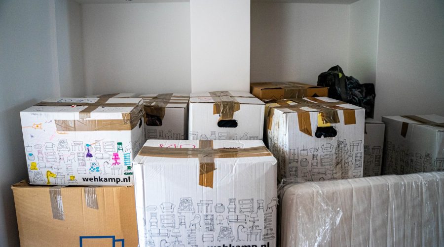 boxes of tenant that moves out leaves stuff behind